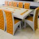 Set masă cu 12 scaune pe culoarea portocaliu cu alb