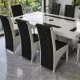Set masă cu 8 scaune pe culoarea negru cu alb